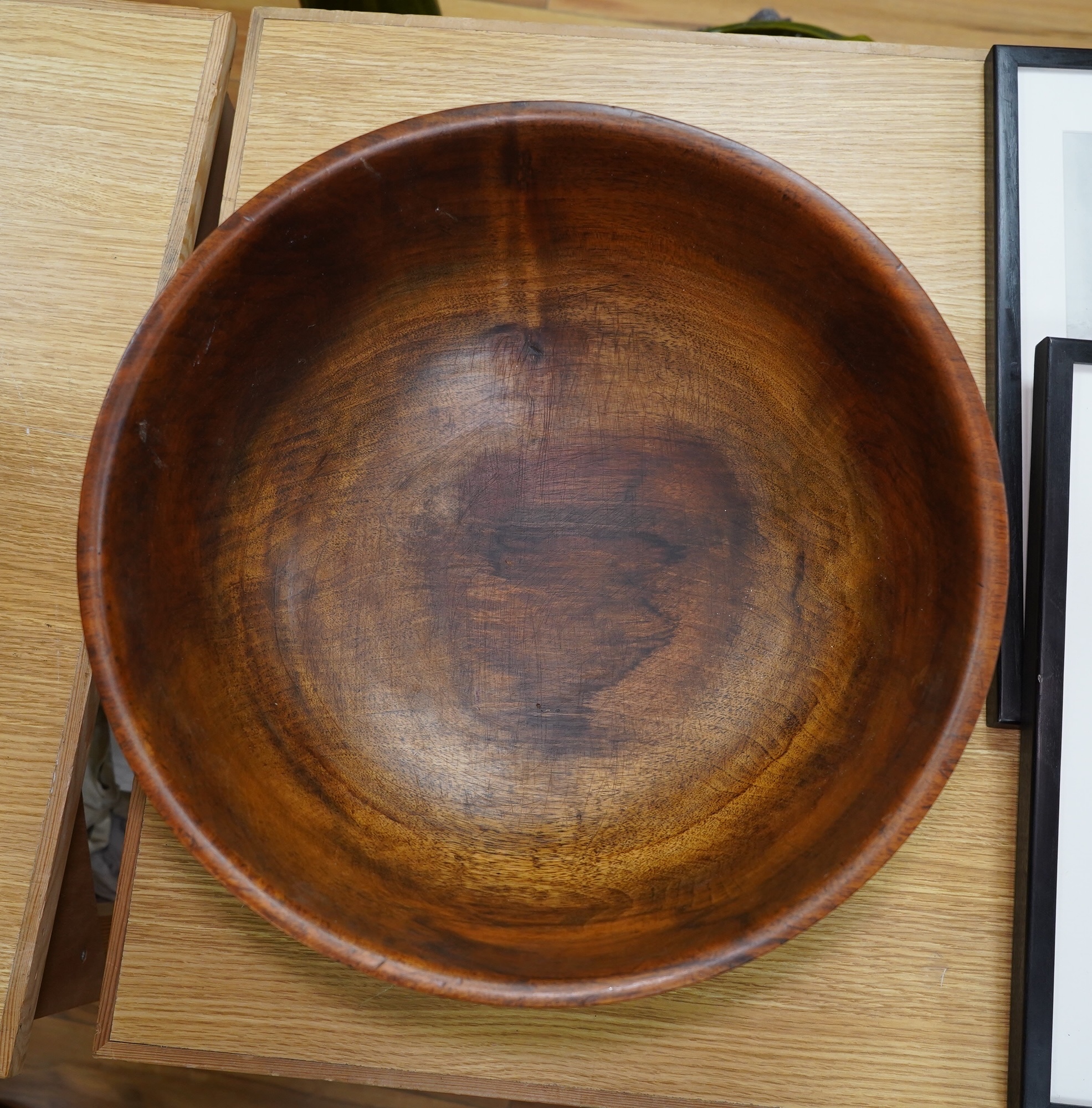 A large turned walnut bowl, carved from the solid, 38cm diameter. Condition - good